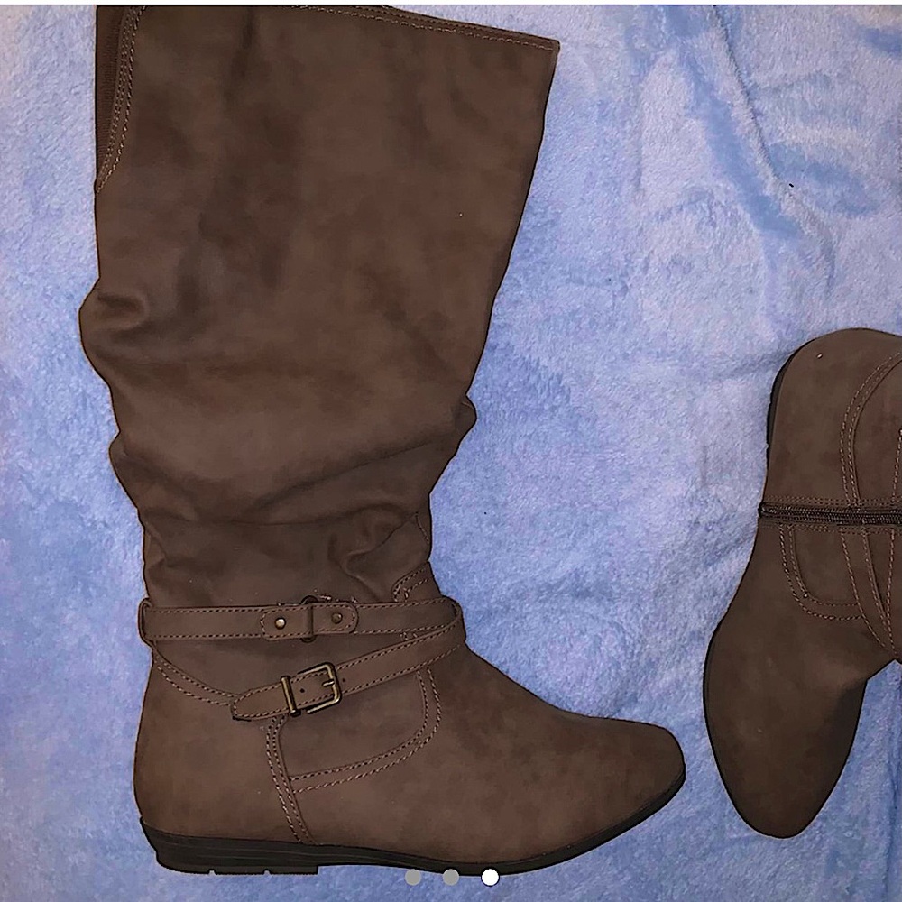 Cute brown knee high boots.